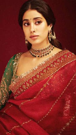 Janhvi Kapoor Exudes Grace and Royalty in a Red Hand-Embroidered Saree with a Green Blouse